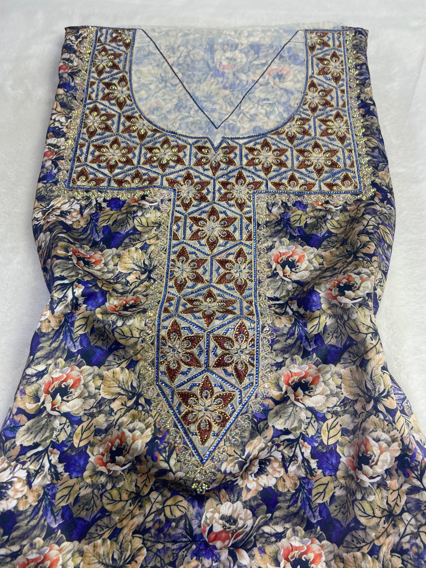Authentic Italian digital silk fabrics with elegant embroidery embellished with 6-pointed stones add a touch of luxury