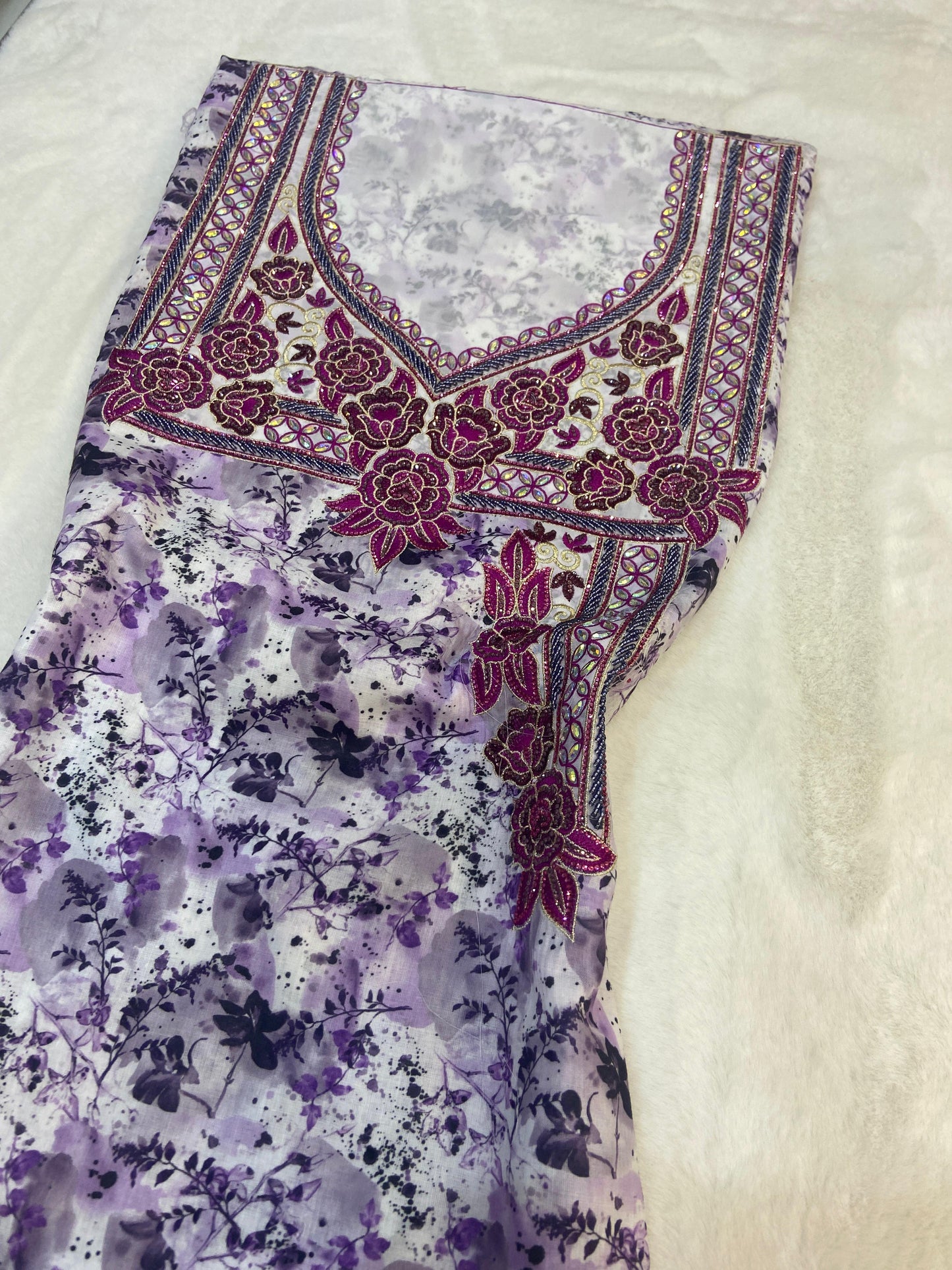 New digital cotton embellished with a six-pointed star design and elegant beads,