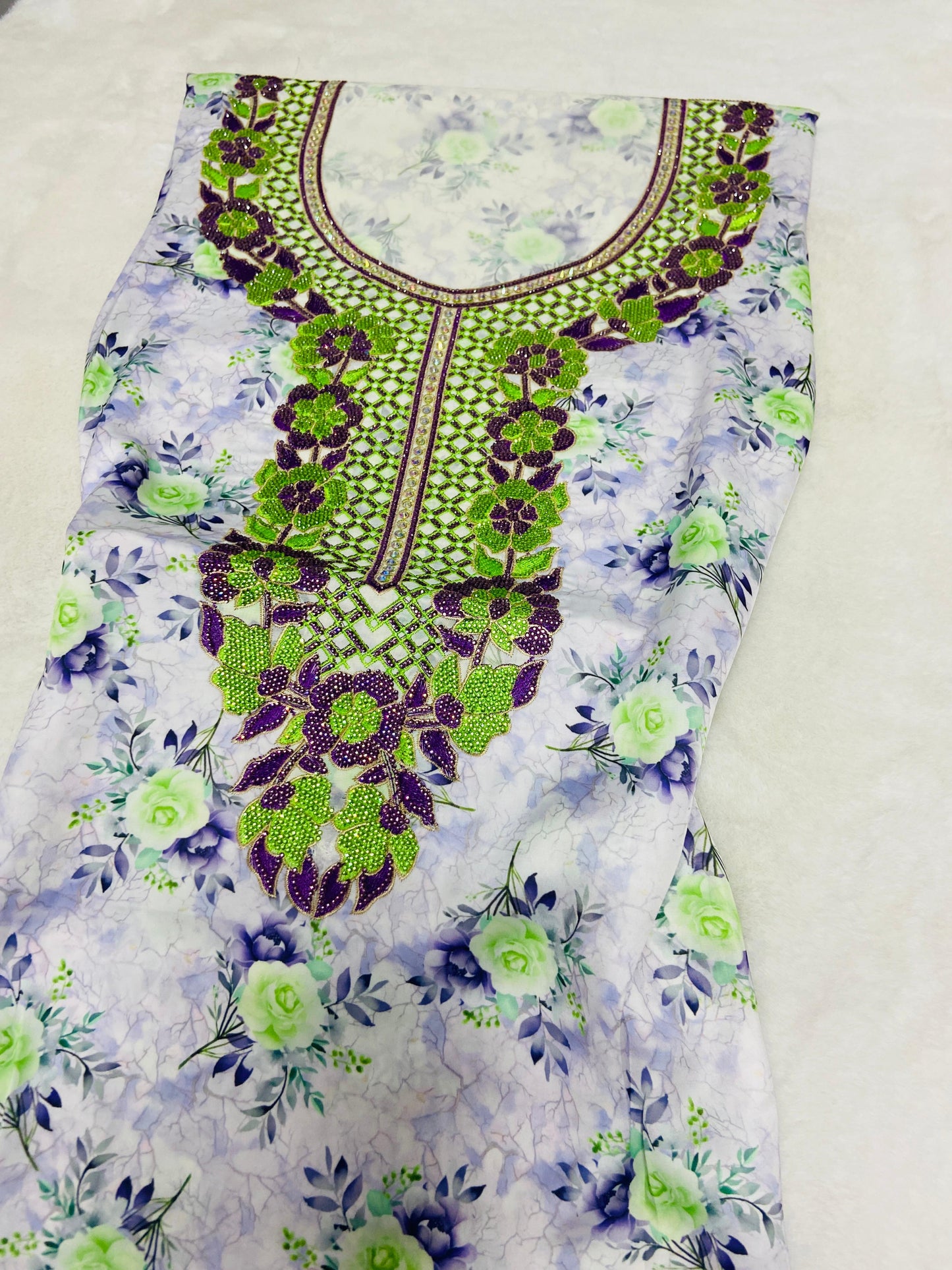 Luxurious Armani silk in a new design, embellished with six original medium-sized rhinestones