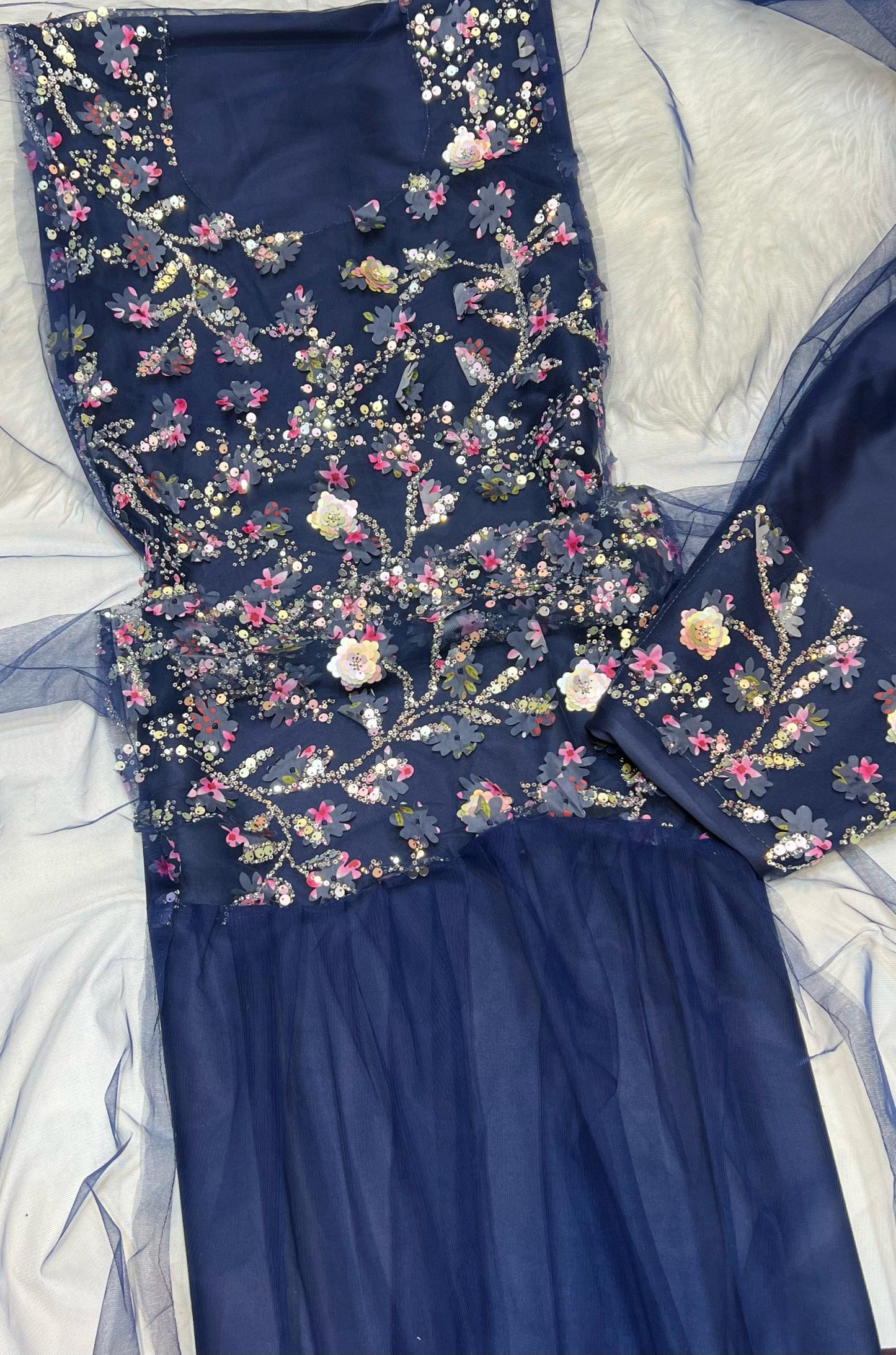 This Jadam dress is crafted from high-quality tur fabric and lined with soft Armani silk,