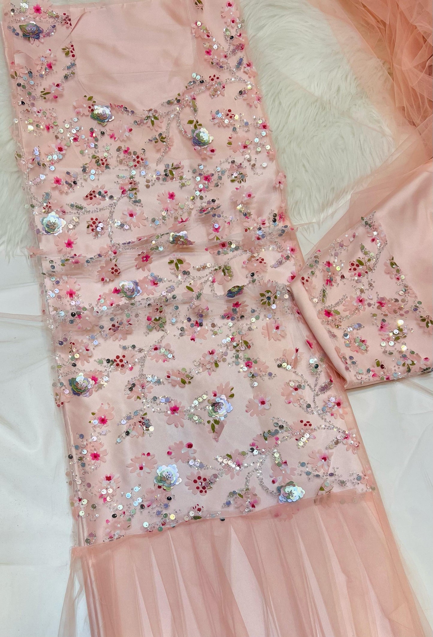This Jadam dress is crafted from high-quality tur fabric and lined with soft Armani silk,