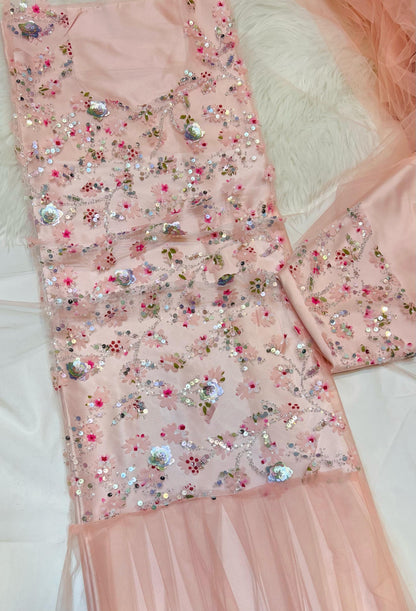 This Jadam dress is crafted from high-quality tur fabric and lined with soft Armani silk,