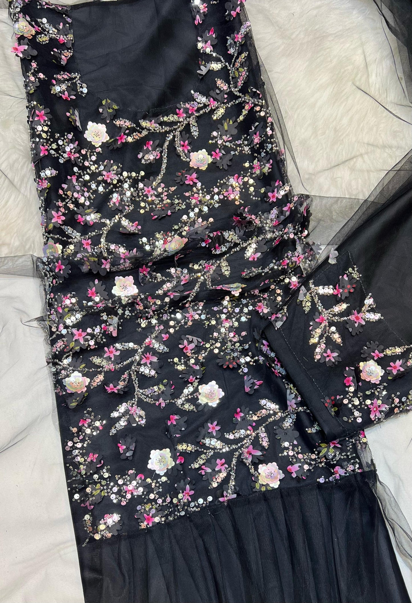 This Jadam dress is crafted from high-quality tur fabric and lined with soft Armani silk,