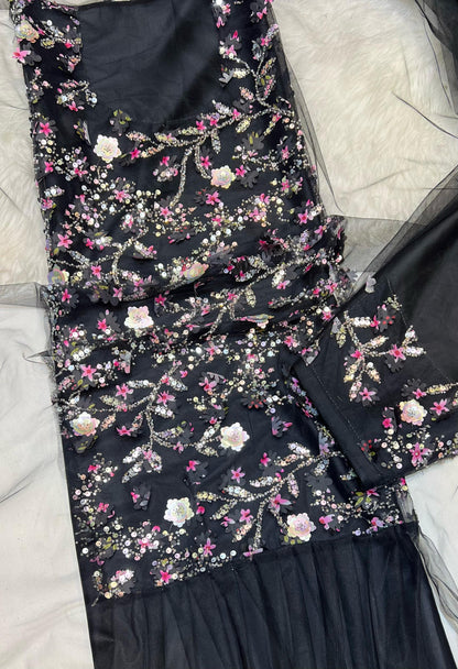 This Jadam dress is crafted from high-quality tur fabric and lined with soft Armani silk,
