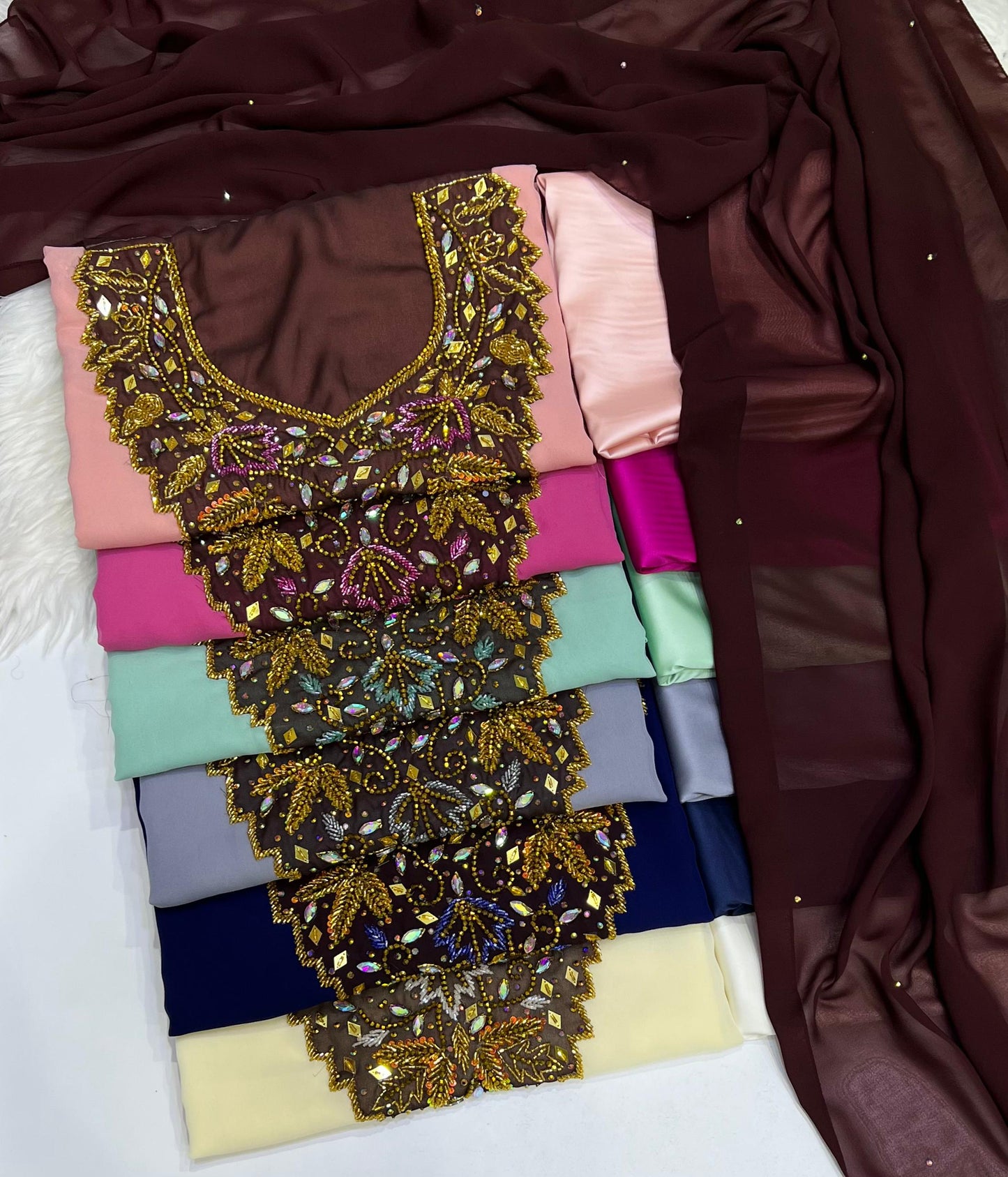 A new dress crafted from luxurious chiffon, adorned with elegant hand-beaded embroidery