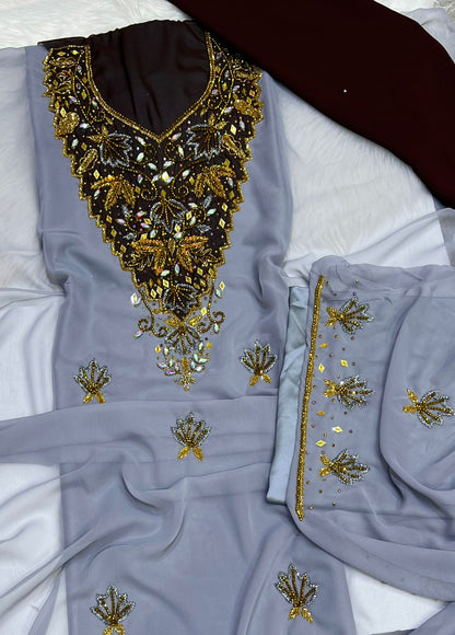 A new dress crafted from luxurious chiffon, adorned with elegant hand-beaded embroidery