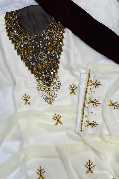A new dress crafted from luxurious chiffon, adorned with elegant hand-beaded embroidery