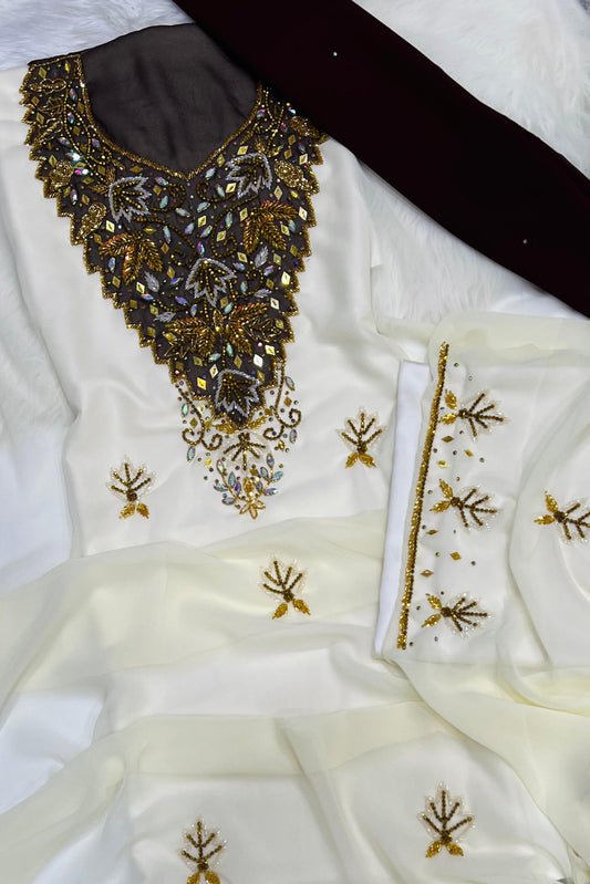 A new dress crafted from luxurious chiffon, adorned with elegant hand-beaded embroidery