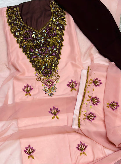 A new dress crafted from luxurious chiffon, adorned with elegant hand-beaded embroidery