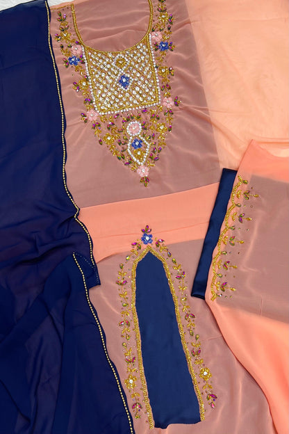 A luxurious abaya crafted from soft chiffon, embellished with delicate beaded embroidery extending down the bodice