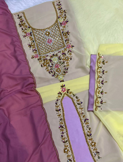 A luxurious abaya crafted from soft chiffon, embellished with delicate beaded embroidery extending down the bodice