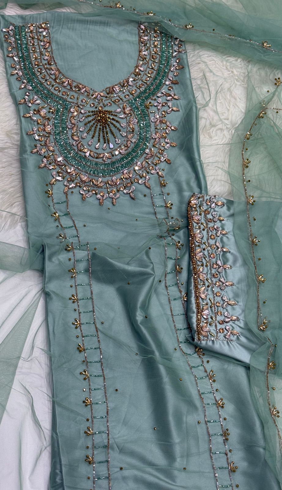 This luxurious set combines high-quality turkish fabric with distinctive beads and crystal elements for a sophisticated sparkle Armani silk