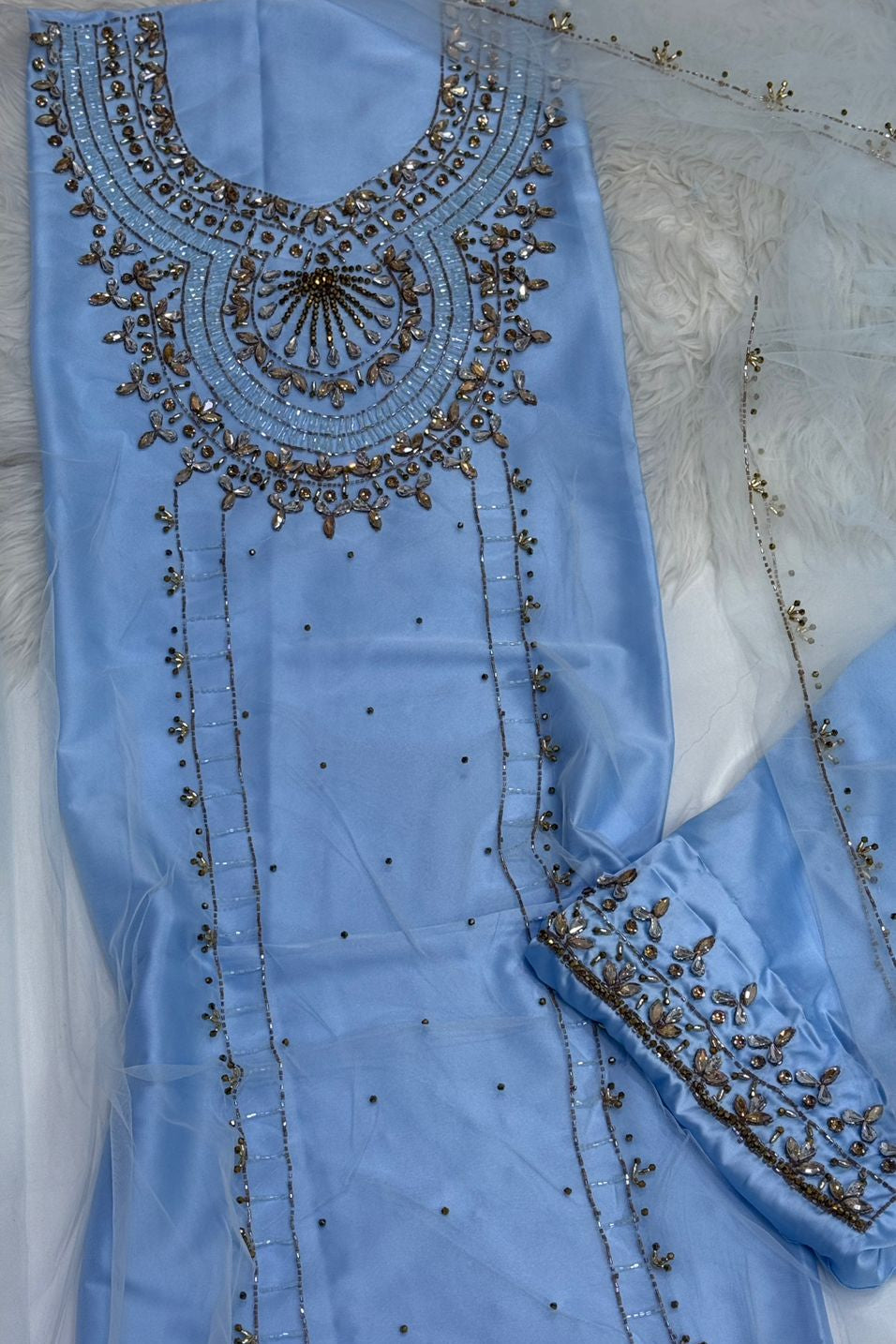 This luxurious set combines high-quality turkish fabric with distinctive beads and crystal elements for a sophisticated sparkle Armani silk