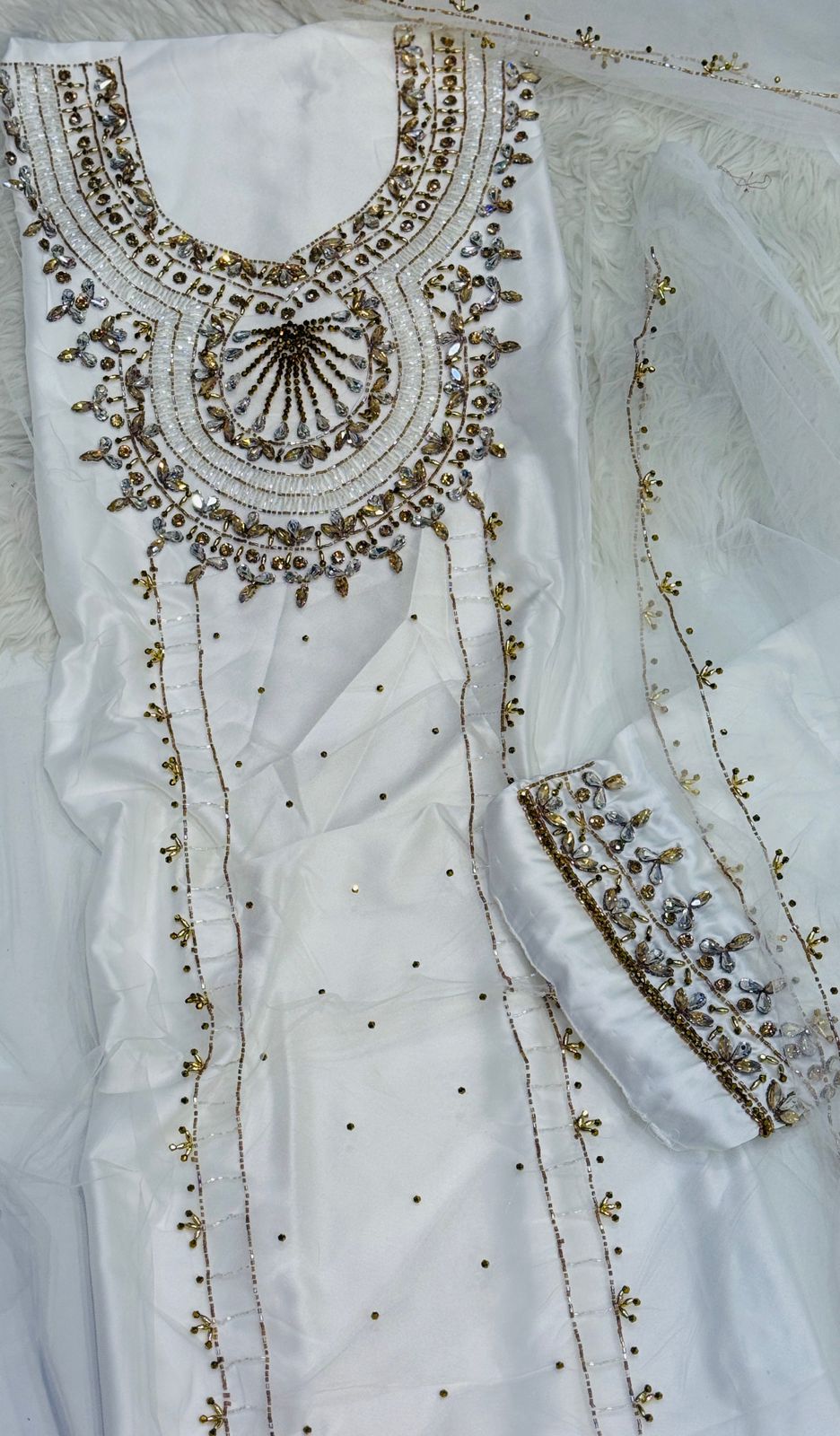 This luxurious set combines high-quality turkish fabric with distinctive beads and crystal elements for a sophisticated sparkle Armani silk