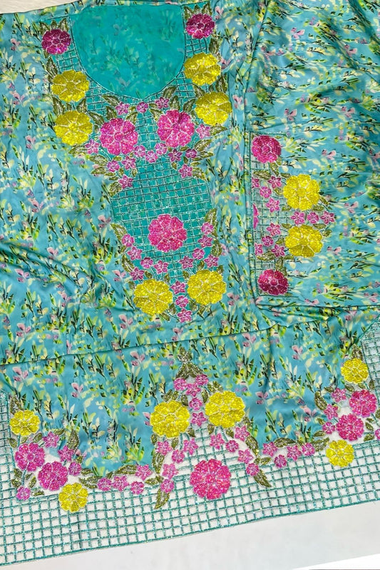 Italian raw silk fabric embellished with intricate embroidery featuring 6-pointed stones and an elegant hemline