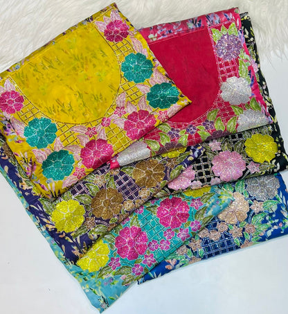 Italian raw silk fabric embellished with intricate embroidery featuring 6-pointed stones and an elegant hemline
