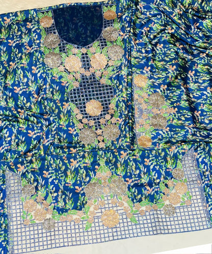 Italian raw silk fabric embellished with intricate embroidery featuring 6-pointed stones and an elegant hemline