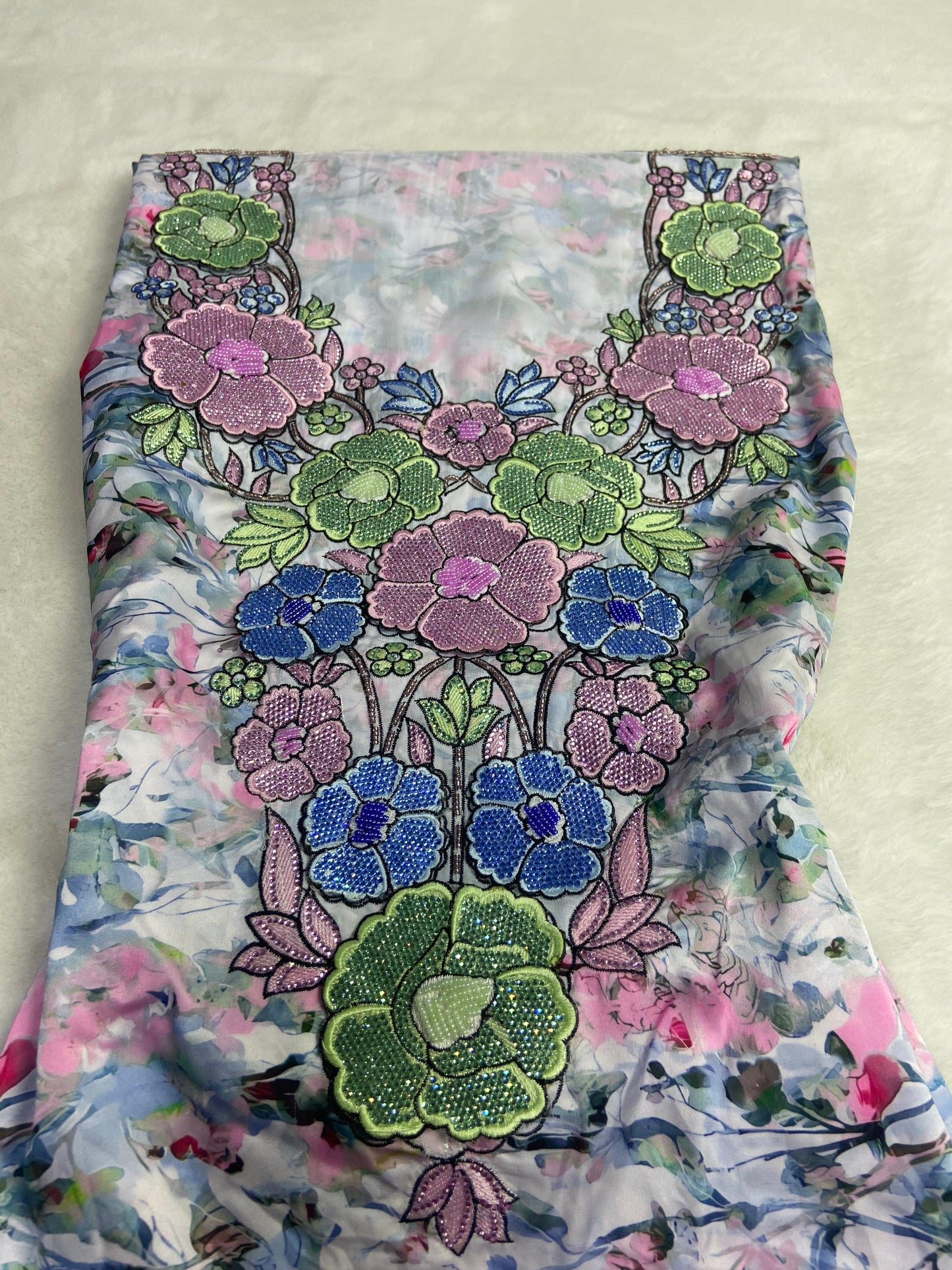 mber 6 rhinestAuthentic Italian raw silk, embellished with 4D embroidery and nuones,