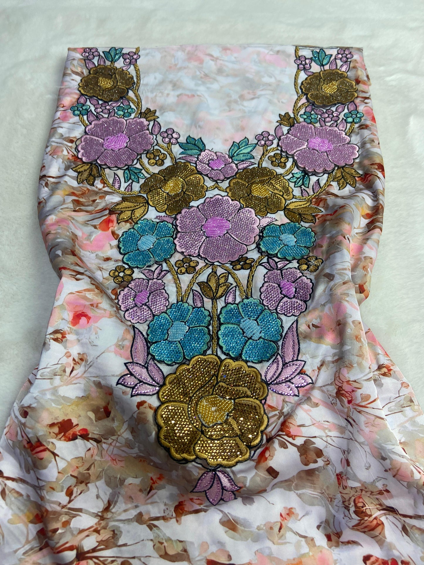 mber 6 rhinestAuthentic Italian raw silk, embellished with 4D embroidery and nuones,