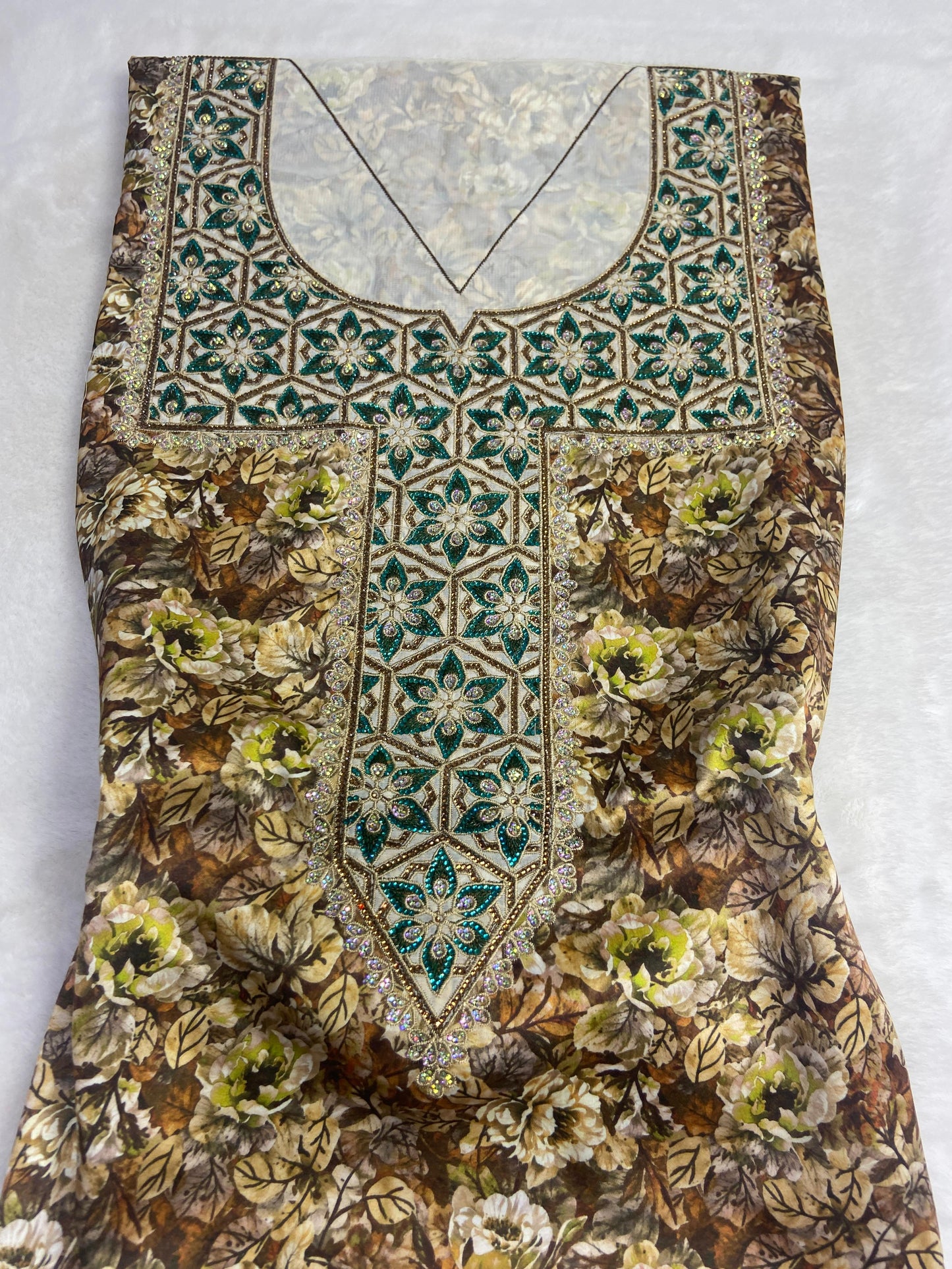 Authentic Italian digital silk fabrics with elegant embroidery embellished with 6-pointed stones add a touch of luxury