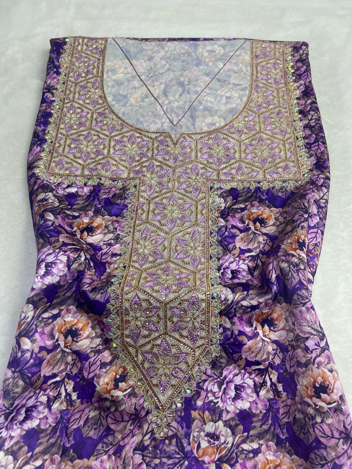 Authentic Italian digital silk fabrics with elegant embroidery embellished with 6-pointed stones add a touch of luxury