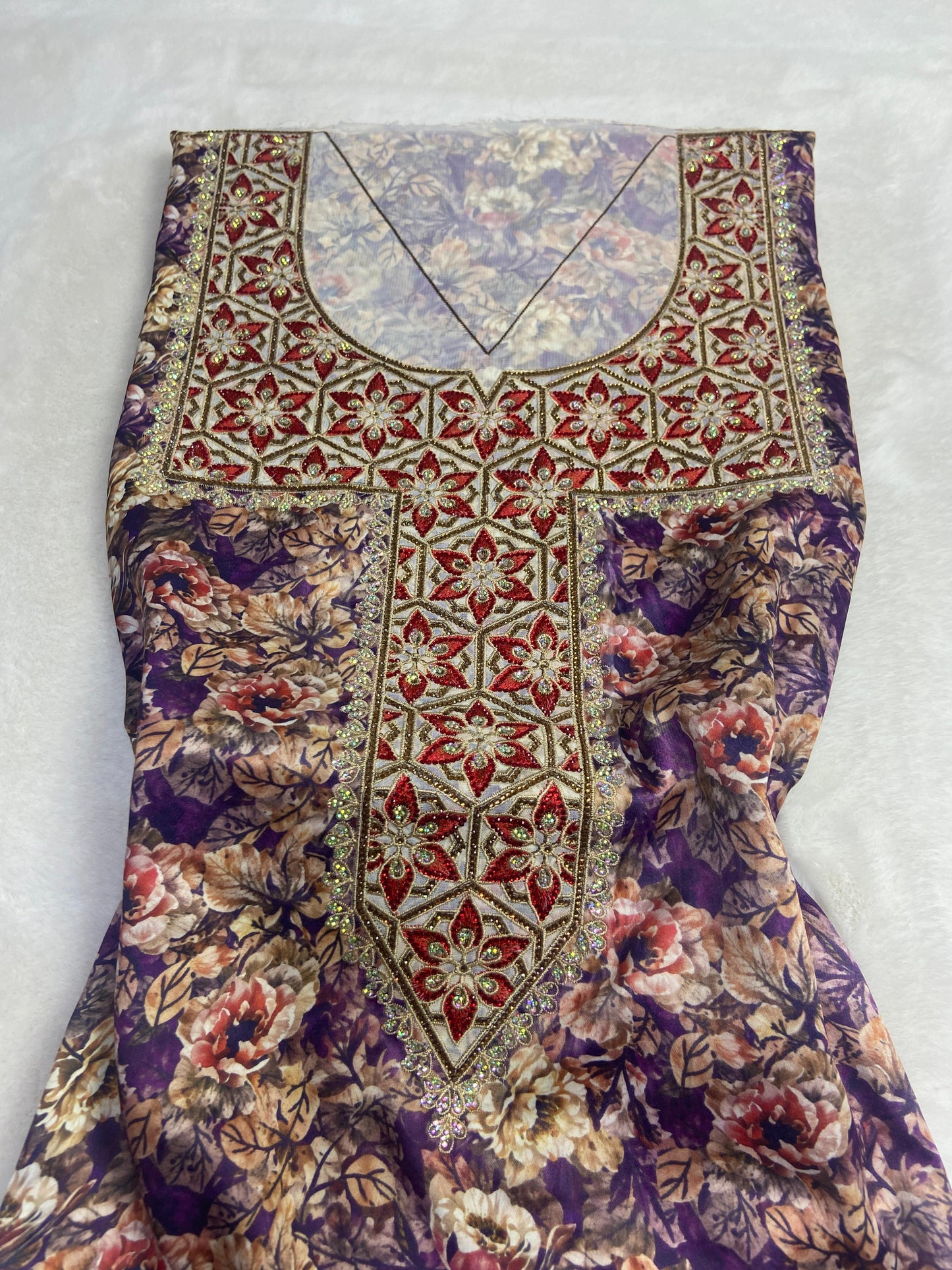 Authentic Italian digital silk fabrics with elegant embroidery embellished with 6-pointed stones add a touch of luxury