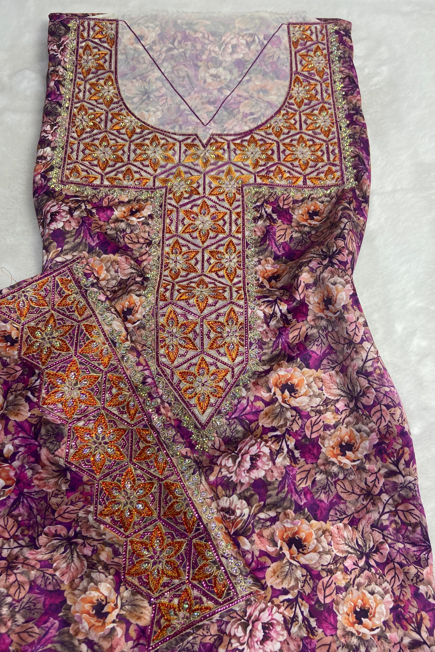 Authentic Italian digital silk fabrics with elegant embroidery embellished with 6-pointed stones add a touch of luxury