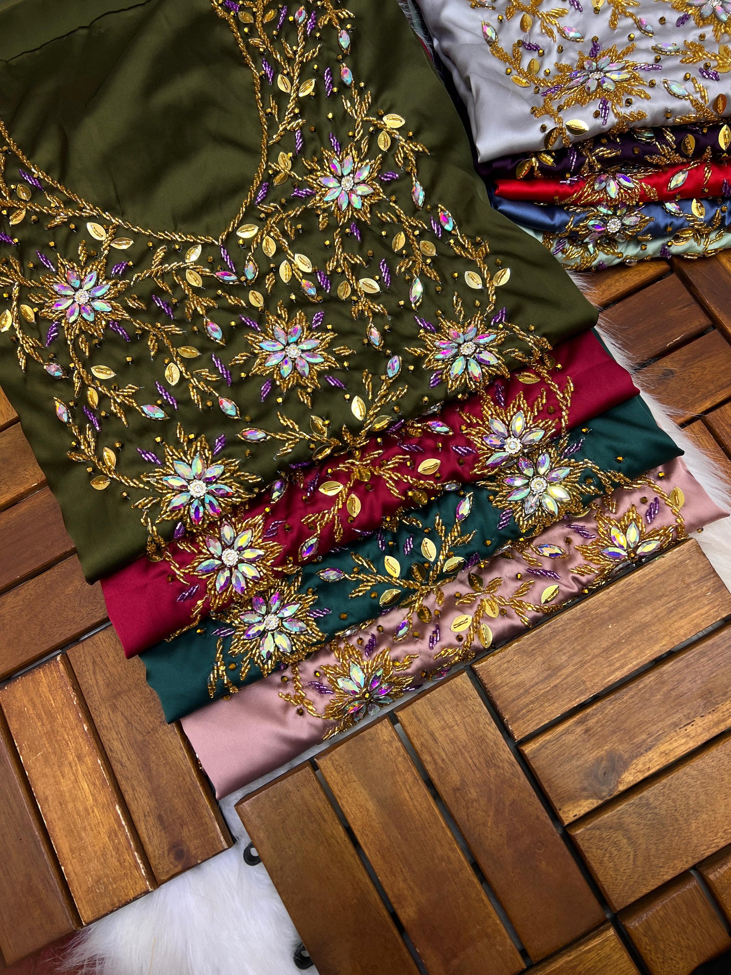 This stunning piece features luxurious Armani silk with intricate Moroccan beadwork, adding an authentic and elegant touch
