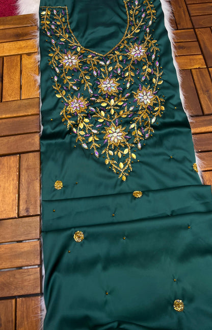 This stunning piece features luxurious Armani silk with intricate Moroccan beadwork, adding an authentic and elegant touch