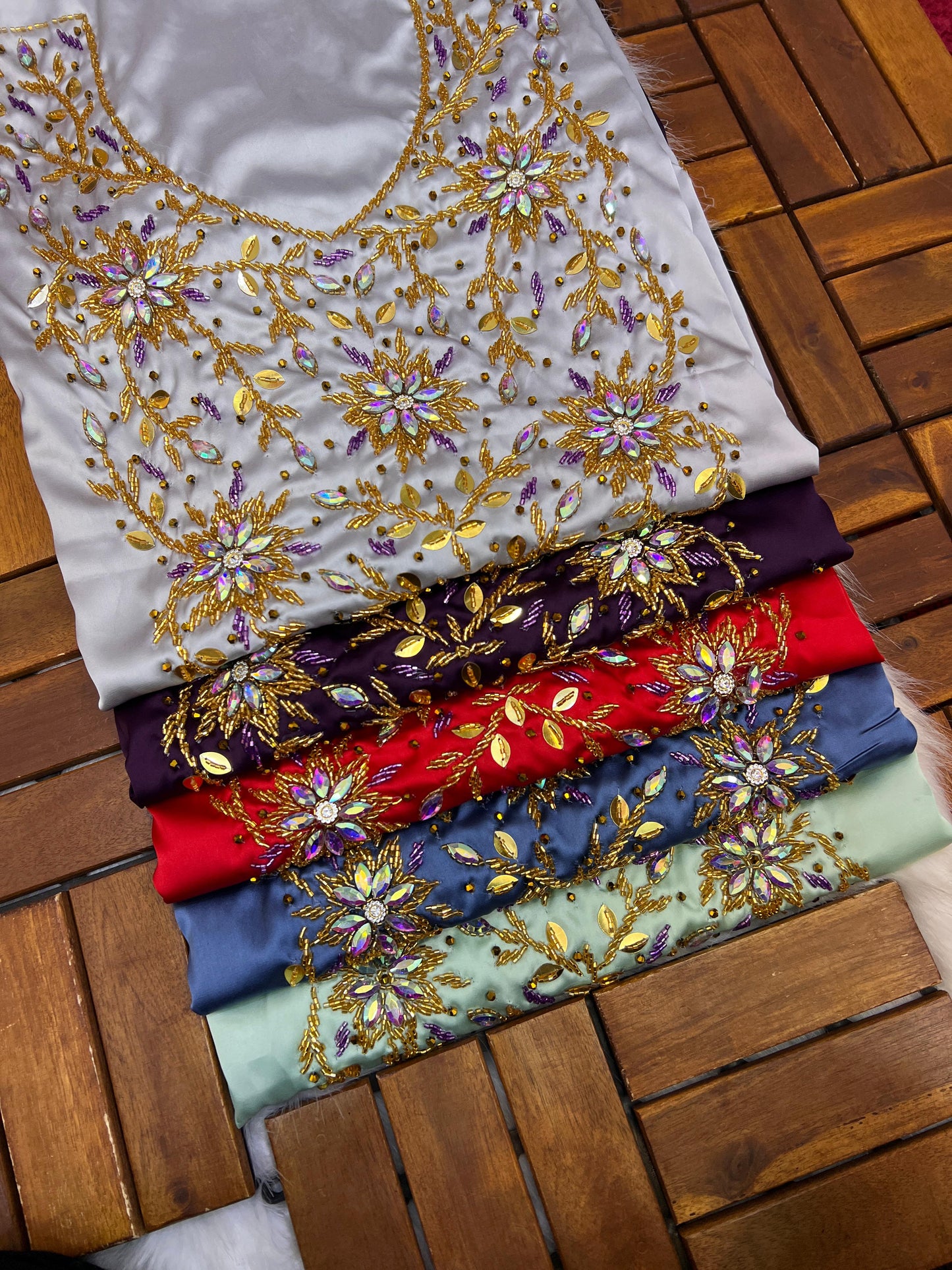 This stunning piece features luxurious Armani silk with intricate Moroccan beadwork, adding an authentic and elegant touch