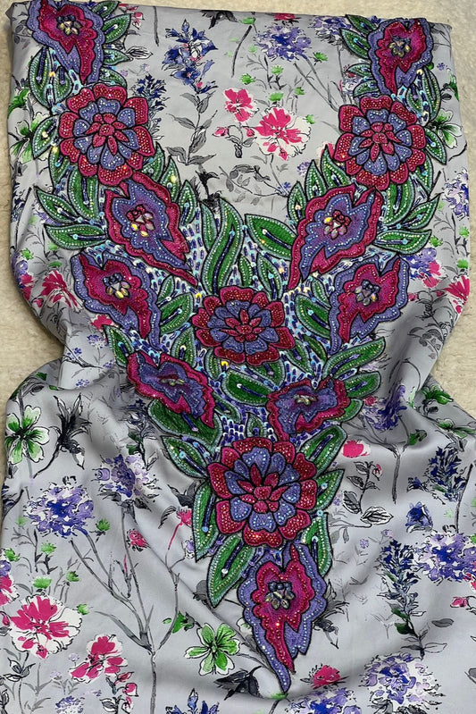 This authentic Italian silk fabric features intricate 3D embroidery with crystals and hand-beaded details