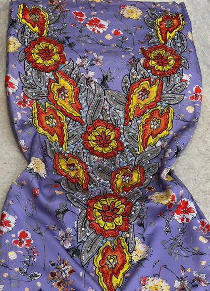 This authentic Italian silk fabric features intricate 3D embroidery with crystals and hand-beaded details