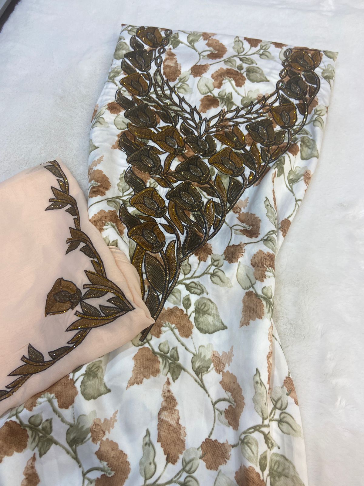 Luxurious Indonesian silk with a newly designed shawl that adds an elegant touch thanks to its distinctive beading. Style No. 6 is now available