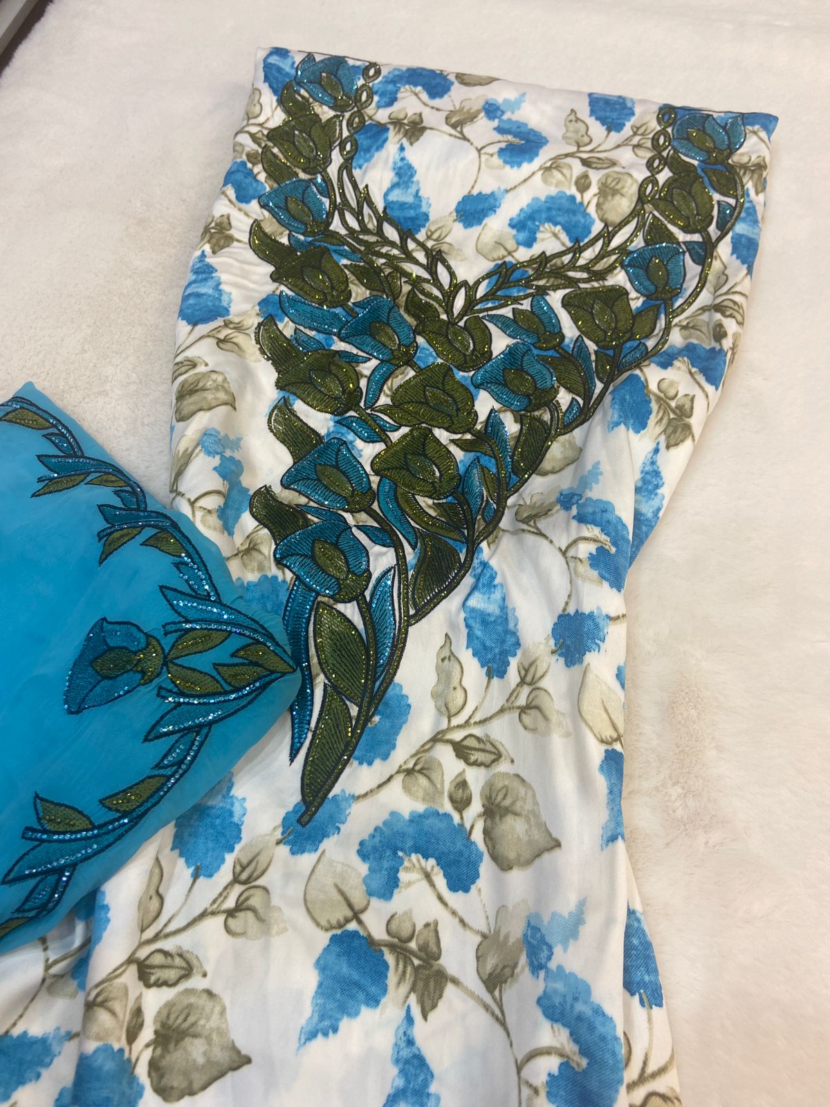 Luxurious Indonesian silk with a newly designed shawl that adds an elegant touch thanks to its distinctive beading. Style No. 6 is now available