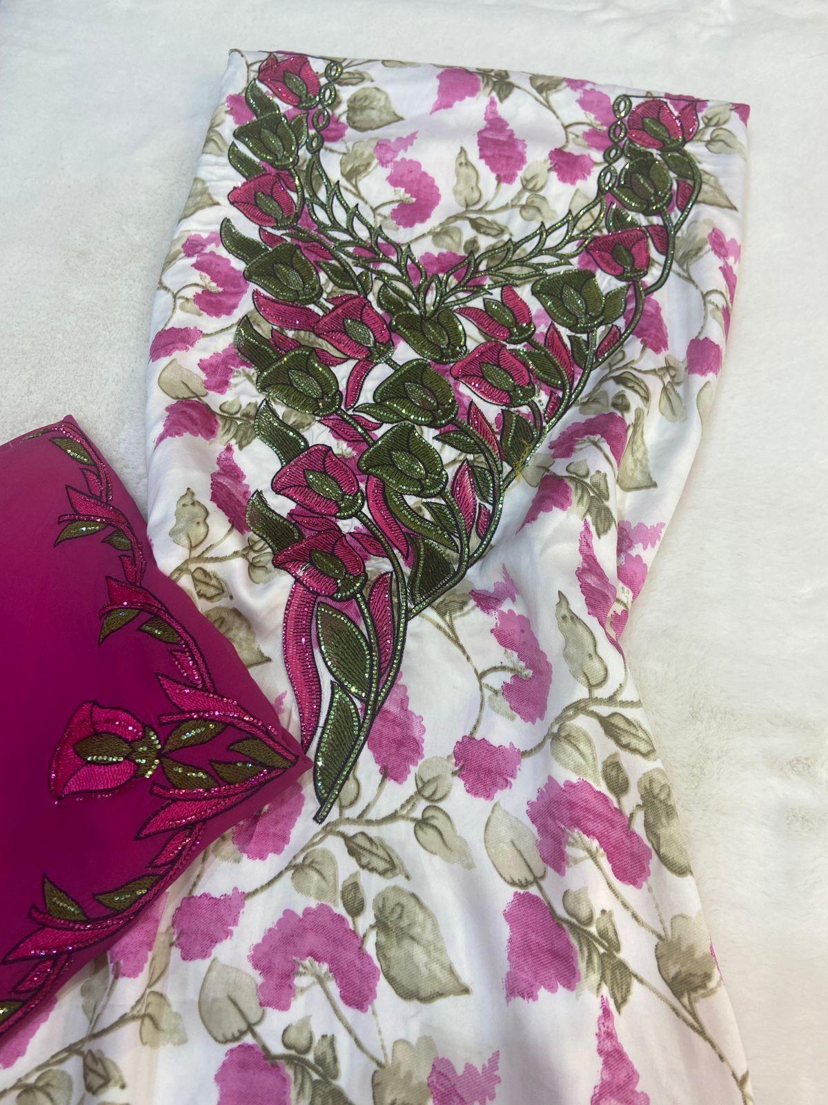 Luxurious Indonesian silk with a newly designed shawl that adds an elegant touch thanks to its distinctive beading. Style No. 6 is now available