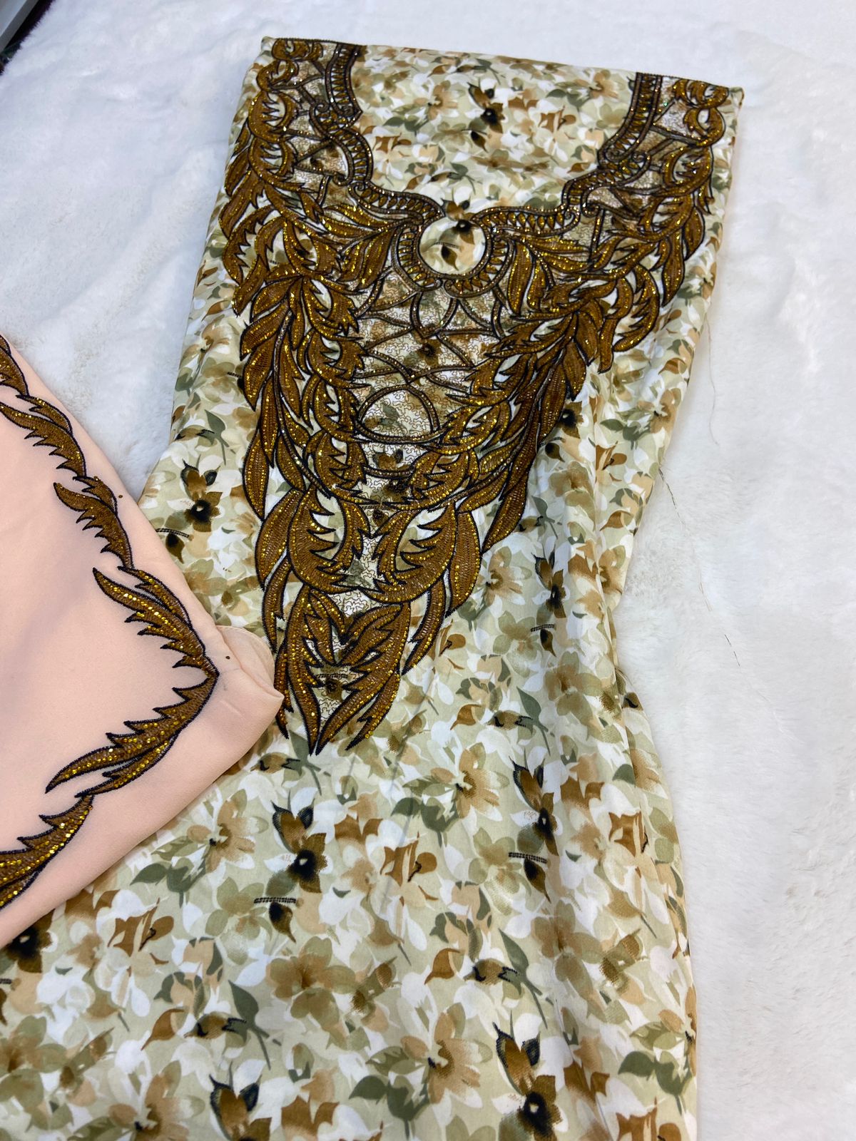 Luxurious Indonesian silk with a newly designed shawl that adds an elegant touch thanks to its distinctive beading. Style No. 6 is now available,