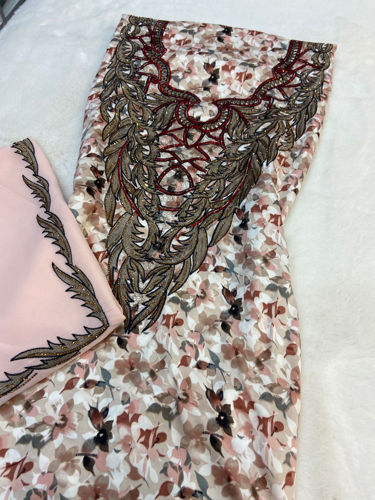 Luxurious Indonesian silk with a newly designed shawl that adds an elegant touch thanks to its distinctive beading. Style No. 6 is now available,