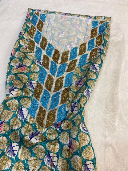 This luxurious Indonesian silk is presented in a new design, adorned with delicately set stones and six beads