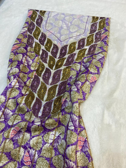This luxurious Indonesian silk is presented in a new design, adorned with delicately set stones and six beads
