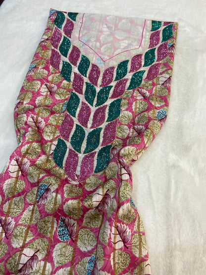 This luxurious Indonesian silk is presented in a new design, adorned with delicately set stones and six beads