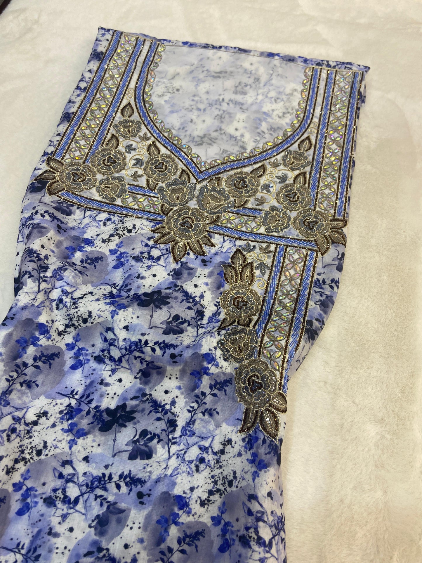 New digital cotton embellished with a six-pointed star design and elegant beads,