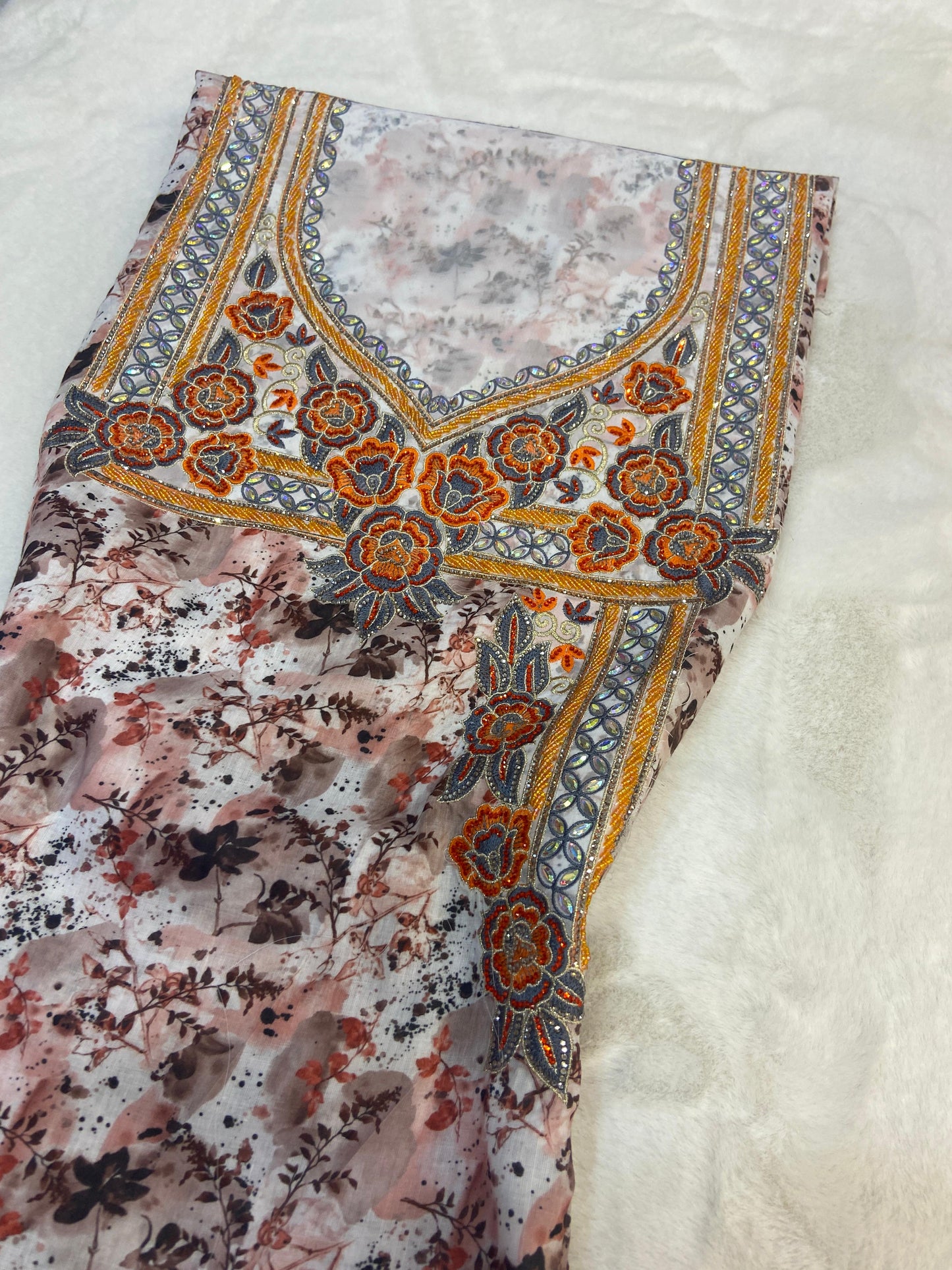 New digital cotton embellished with a six-pointed star design and elegant beads,