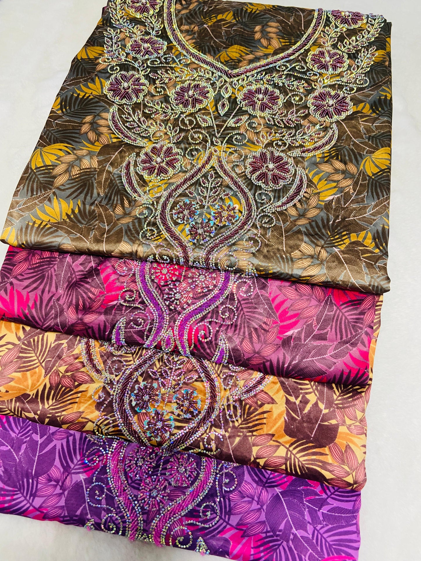 Enjoy the luxury of new digital silk, featuring an integrated design with six-pointed stones and exquisite khars embroidery