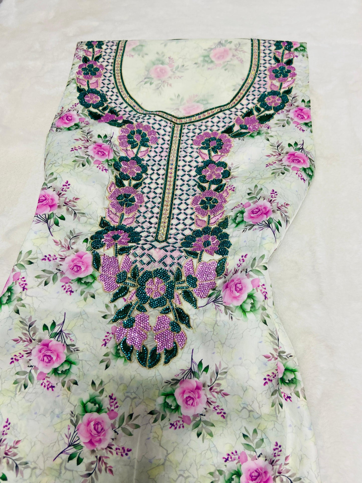 Luxurious Armani silk in a new design, embellished with six original medium-sized rhinestones
