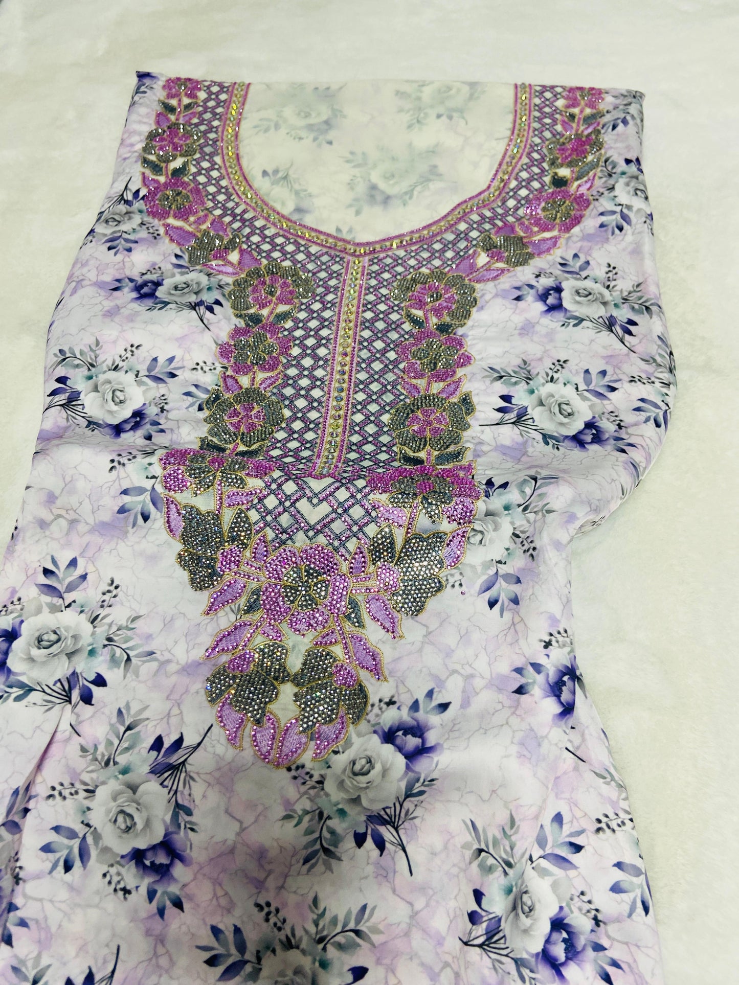 Luxurious Armani silk in a new design, embellished with six original medium-sized rhinestones