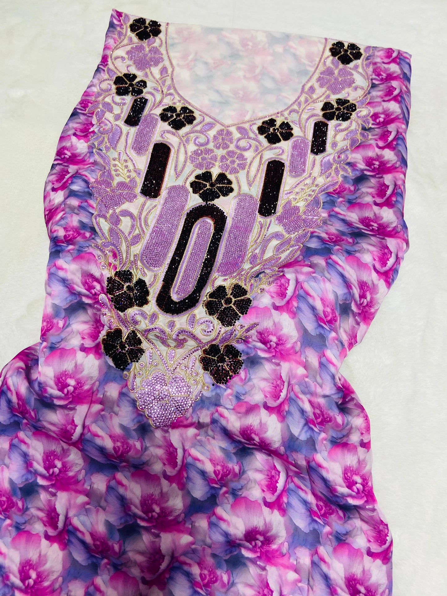Luxurious Armani silk in a new design, embellished with six original medium-sized rhinestones