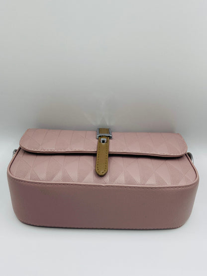 This handbag is a structured, genuine leather tote-style bag designed for modern women who value both elegance and functionality.