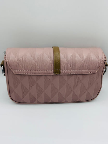 This handbag is a structured, genuine leather tote-style bag designed for modern women who value both elegance and functionality.