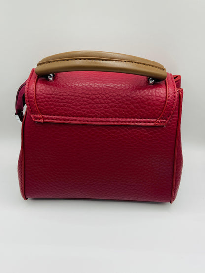 This handbag is a structured, genuine leather tote-style bag designed for modern women who value both elegance and functionality.