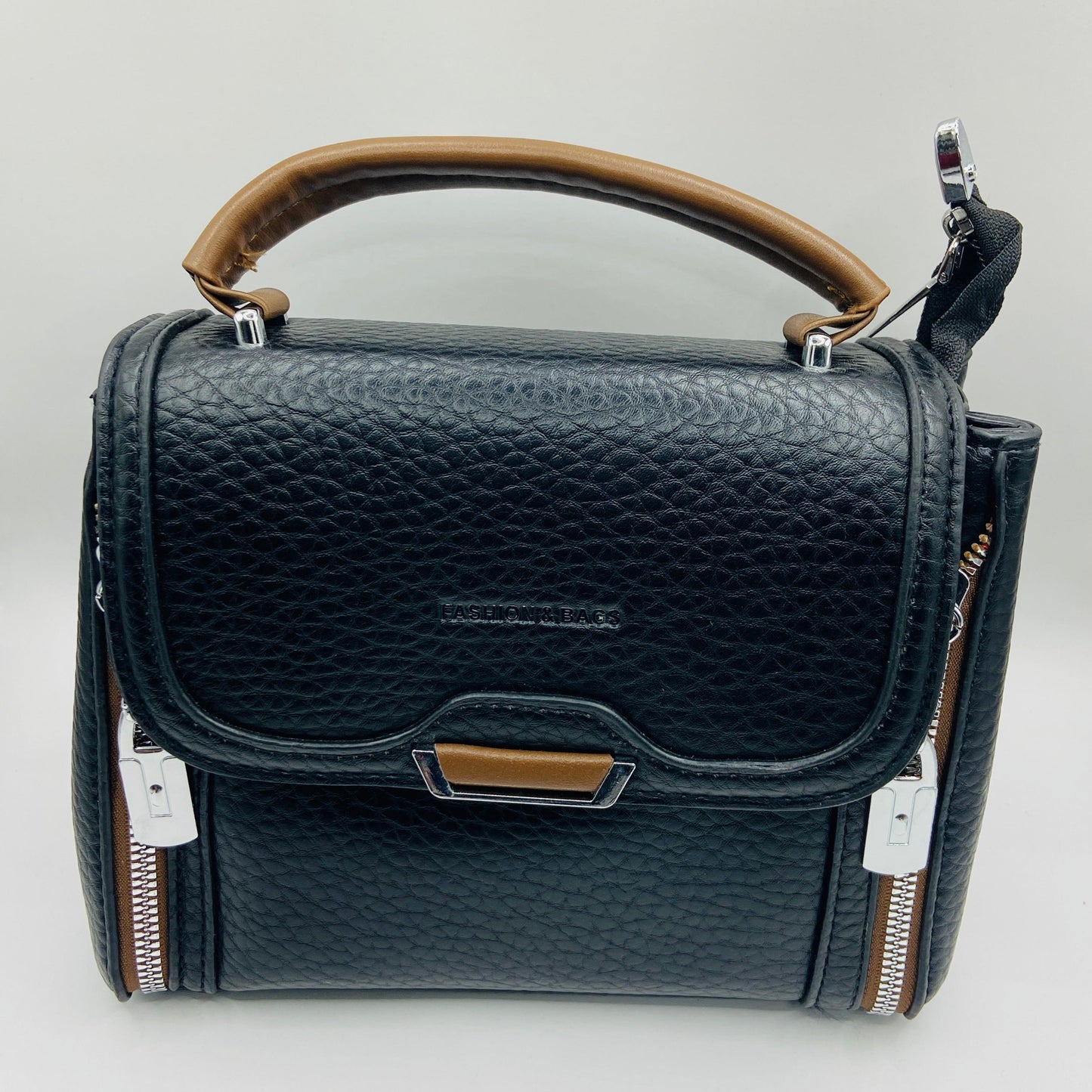 This handbag is a structured, genuine leather tote-style bag designed for modern women who value both elegance and functionality.